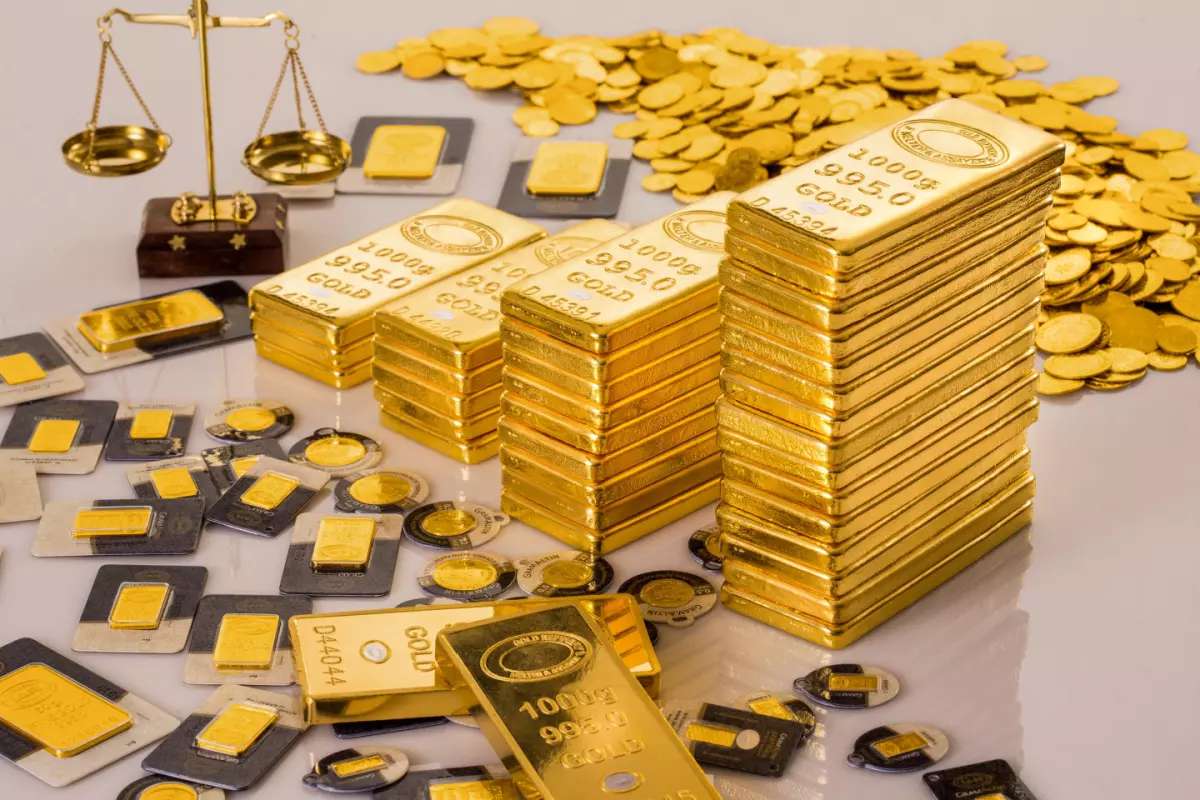 Stacks of gold coins and bars